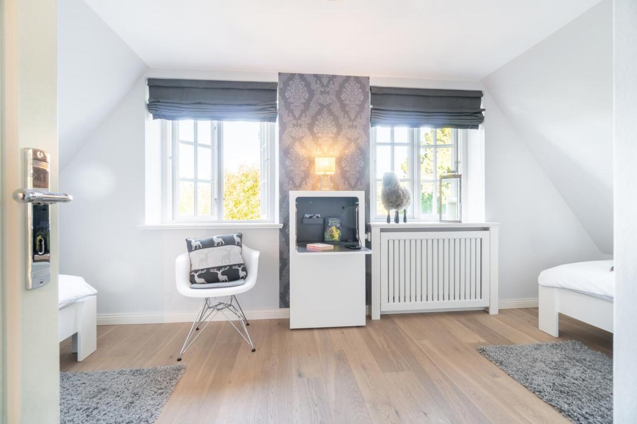 Min Eilun Villa Utersum Buitenkant foto